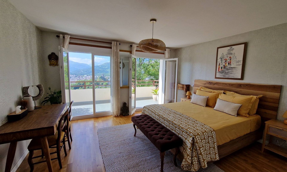Lourdes Bed & Breakfast | guest room overlooking the town of Lourdes and splendid view of the Pyrenees
