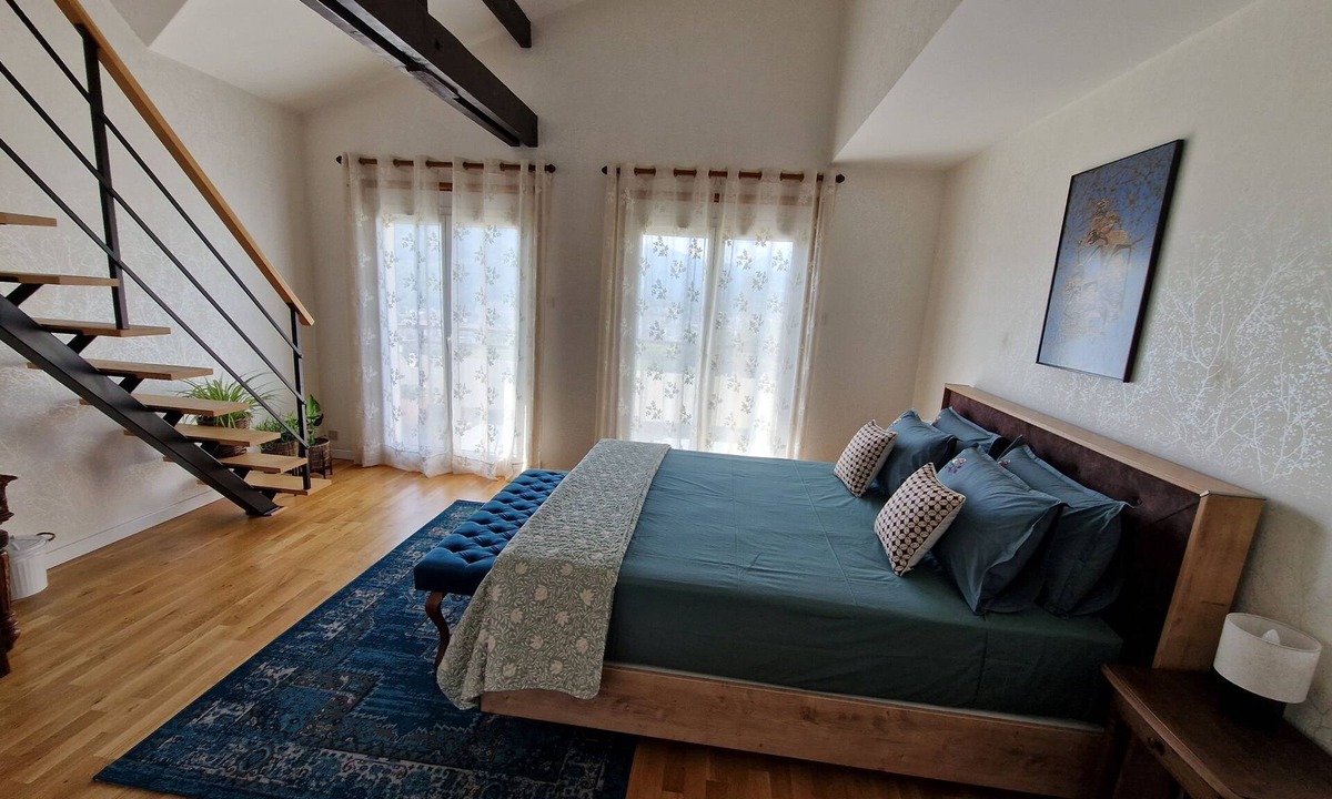 Lourdes Bed & Breakfast | guest room overlooking the town of Lourdes and splendid view of the Pyrenees