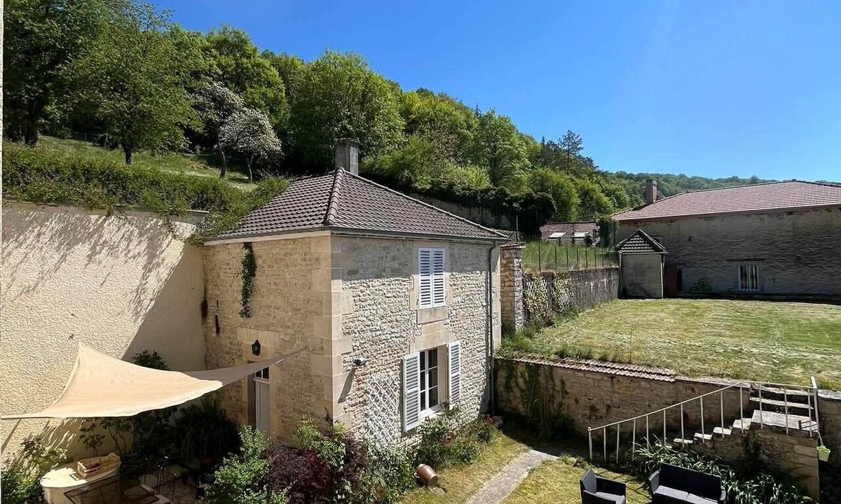 Cirey-sur-Blaise House | La demeure aux Lilas a large stone mansion