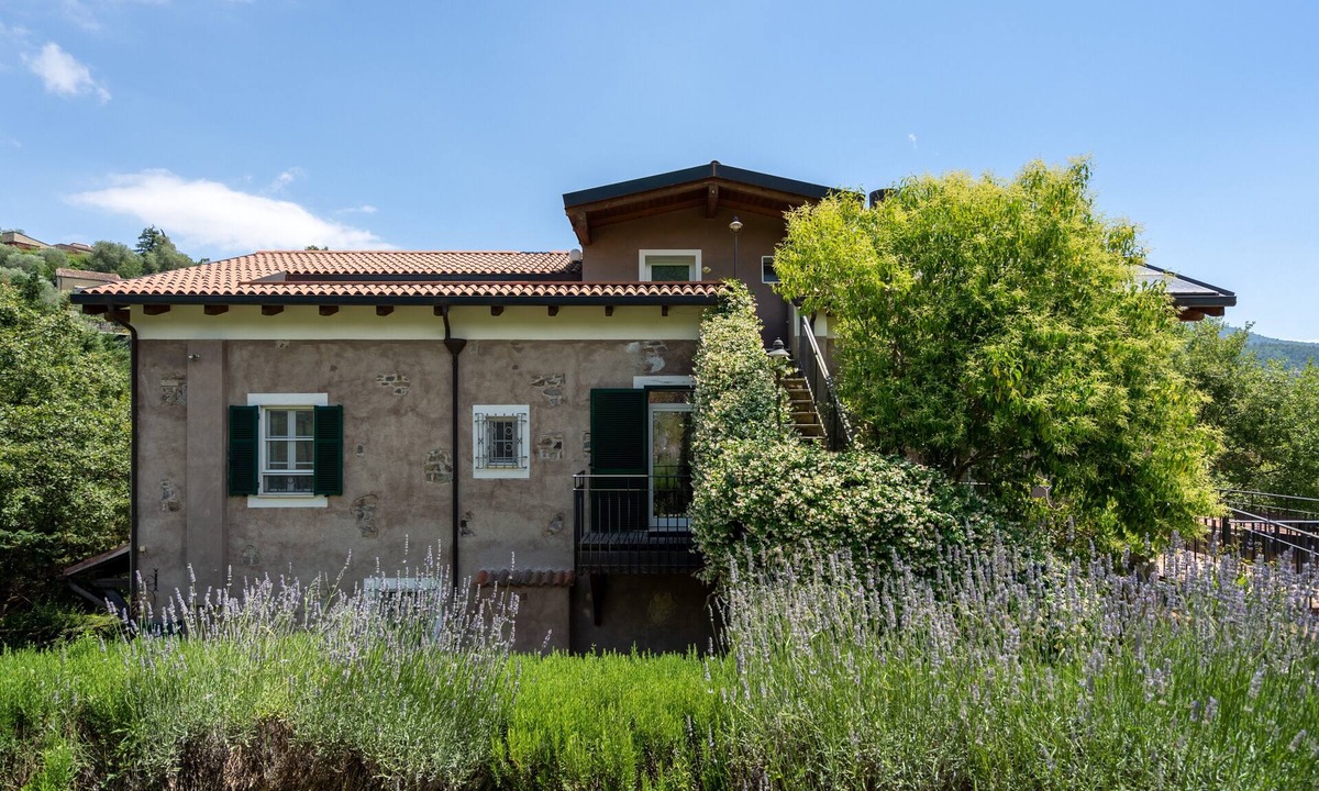 Garlenda Apartment | Rosmarino Apartment with Mountain View. Shared Garden, Pool, and Wi-Fi