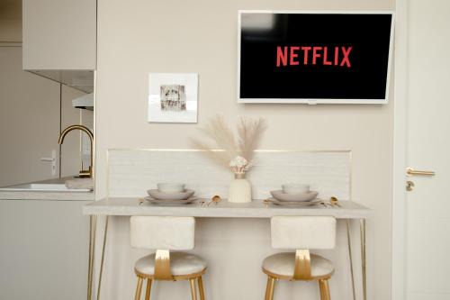 Homecourt Apartment | Studio meublé L'écrin doré avec Netflix