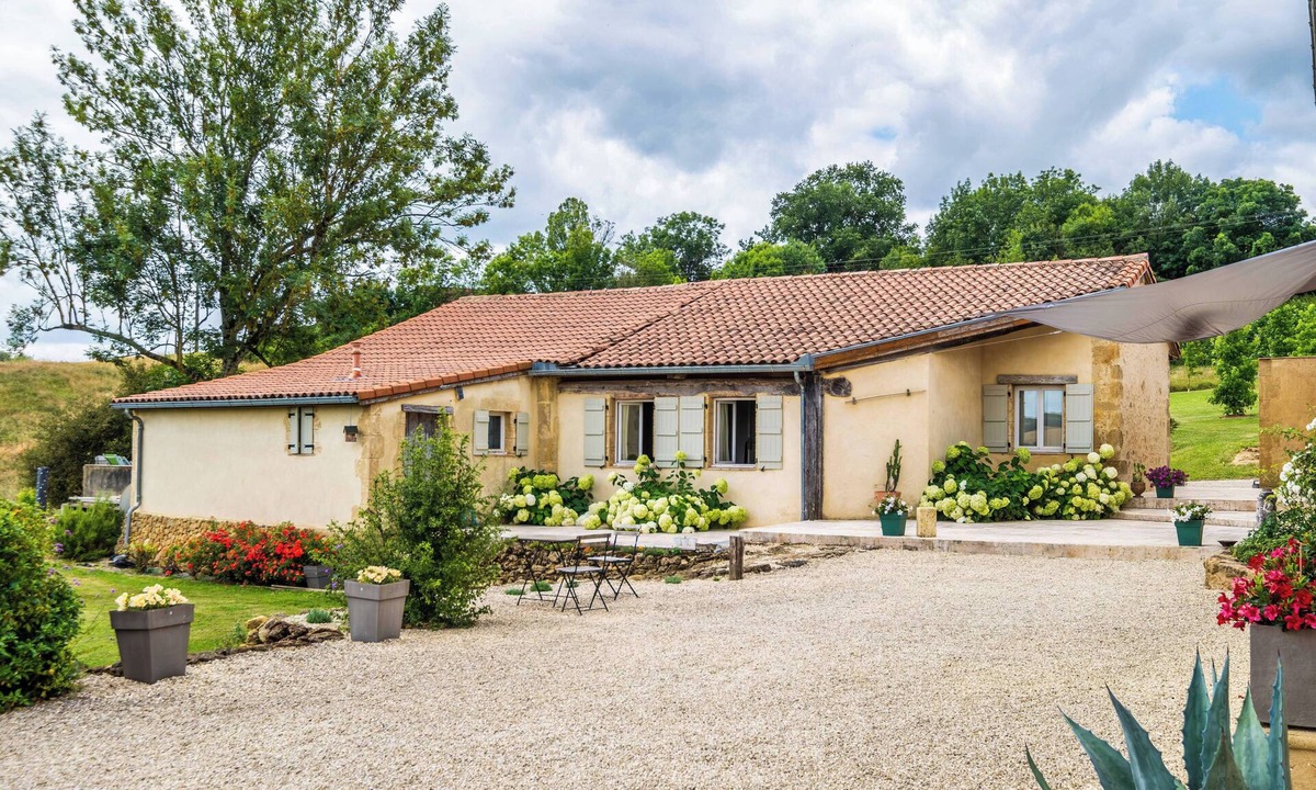 Saint-Justin Cottage | Villa at Bel-Endroit — Elegant Retreat with Terrace, Pool and Views of lake