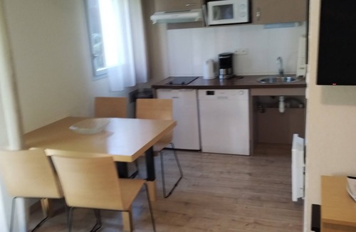 Ax-les-Thermes Apartment | 2-room apartment in Ax-les-Thermes with garden-level entry, pool, and wheelchair-accessible features