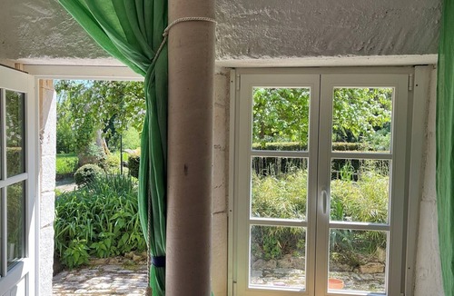 Hagneville-et-Roncourt Apartment | A 16th-century dovecote surrounded by the beautiful grounds of Roncourt Castle