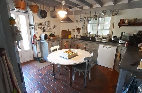 Mesland House | A rustic farmhouse with all the comforts, featuring a tree-lined garden and a pool