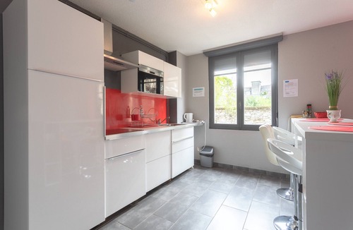 Lourdes Apartment | Apartment "Le Vignemale" in Lourdes, 4 guests, private garden, balcony, fast Wi-Fi, near sights