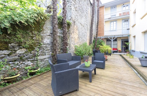 Lourdes Apartment | Apartment "Le Vignemale" in Lourdes, 4 guests, private garden, balcony, fast Wi-Fi, near sights