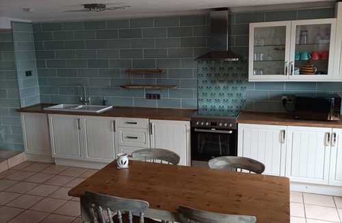 Meneac House | Countryside cottage with Nordic wood fired spa & above ground swimming pool