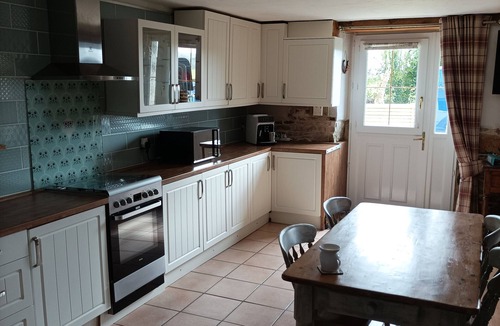 Meneac House | Countryside cottage with Nordic wood fired spa & above ground swimming pool