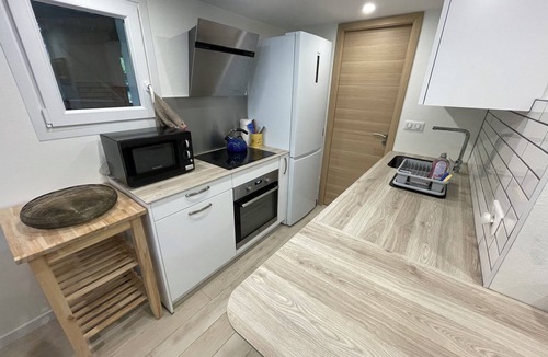 Duingt Apartment | Cozy home on Lake Annecy - walking distance to the beach, private garden, wood-burning stove & mountains