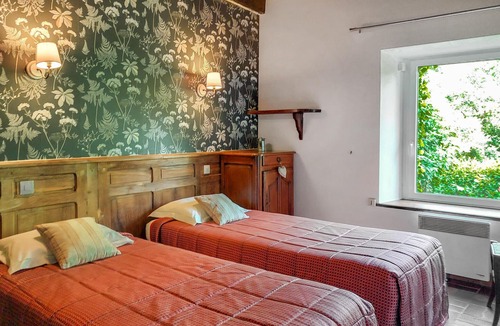 Le Ponthou House | Enjoy an unforgettable time in this idyllically located vacation home with outdoor hot tub.