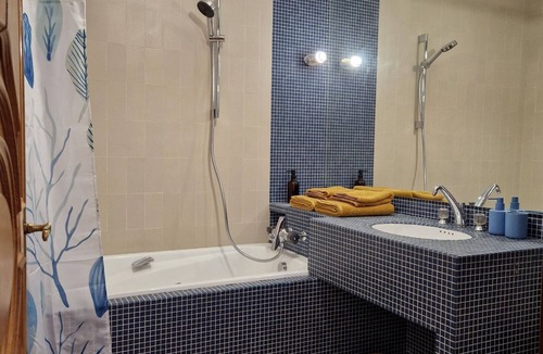 Lourdes Bed & Breakfast | guest room overlooking the town of Lourdes and splendid view of the Pyrenees