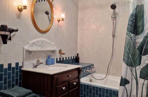 Lourdes Bed & Breakfast | guest room overlooking the town of Lourdes and splendid view of the Pyrenees
