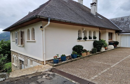 Lourdes Bed & Breakfast | guest room overlooking the town of Lourdes and splendid view of the Pyrenees