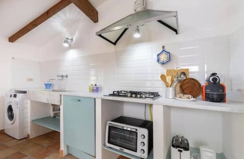Garlenda Apartment | Hostdomus - Olive & Garden 1