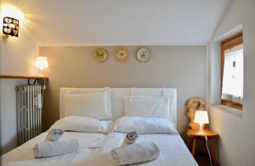Borgata Sestriere Apartment | Hostdomus - Rifugio delle Stelle Ski in, Ski Out, Parking
