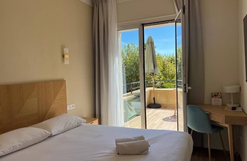 Sanary-sur-Mer Hotel | Hotel Comfort Seconds from Sand! Relax w/Terrace and Lush Garden