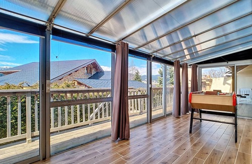 Real House | House in Formigueres Real with a sunroom, game room, and a terrace with a fire pit