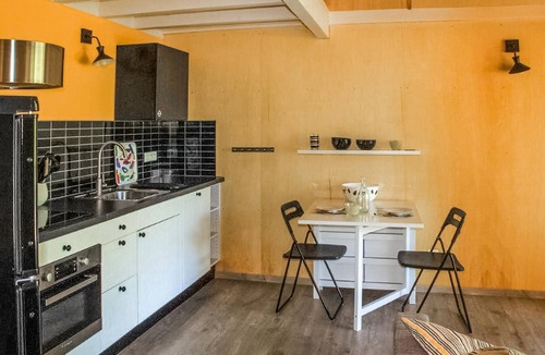 Mirandol-Bourgnounac House | In idyllic location of a forest and near the river Vaur is this cozy wooden house.