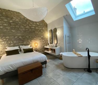 Ay Bed & Breakfast | La Suite Arbane - chambre d'hôtes avec sauna chez le vigneron