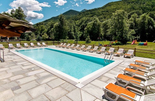 Sampeyre Apartment | Lovely apartment for 4 guests with WIFI, pool, TV and terrace