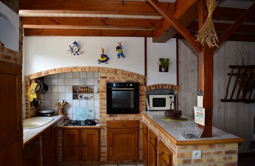 La Taillee House | Marais Poitevin, riverside vacation rental, FISHING, rowboat, bicycles, fireplace, bocce court