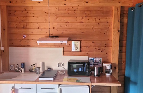 Marsoulas Apartment | Reflet de Bien être : Wooden loft for 3 people with enclosed courtyard.