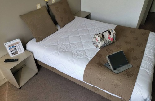 Lourdes Hotel | Relax in Comfortable Rooms with Parking and Easy Access to Attractions