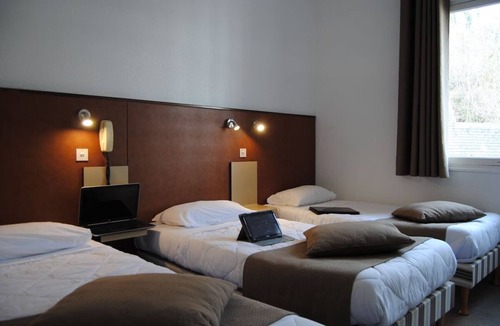 Lourdes Hotel | Serene Family Suite with Ample Space & Balcony - Parking