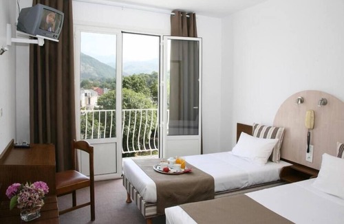 Lourdes Hotel | Serene & Spacious Unit with Balcony, Parking, Onsite Restaurant!