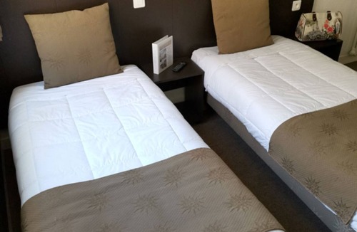 Lourdes Hotel | Serene & Spacious Unit with Balcony, Parking, Onsite Restaurant!
