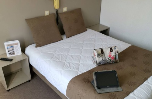 Lourdes Hotel | Spacious Unit Stay, Secure Parking, Scenic Views!