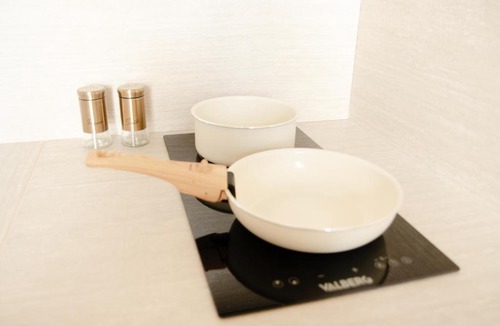 Homecourt Apartment | Studio meublé Le Refuge doré avec Netflix