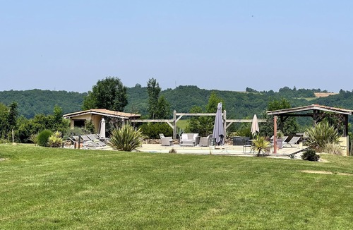 Saint-Justin Cottage | Villa at Bel-Endroit — Elegant Retreat with Terrace, Pool and Views of lake