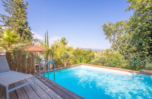 Cuers Villa | Villa 'Palmiers En Couleurs' with Mountain View, Private Pool, and Wi-Fi