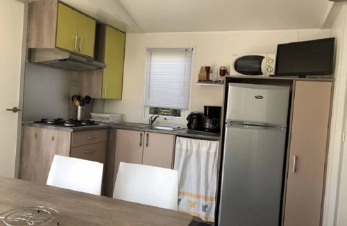 Roquefeuil House | ZEcamping 3 étoiles pataugeoire dog friendly mobil-home TV BBQ clim