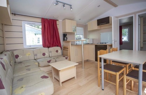 Foix House | ZEcamping 4* pataugeoire pet friendly sauna locatif TV 32m2 4 pers