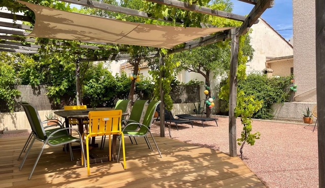 Completely renovated fisherman's house with garden near the port.