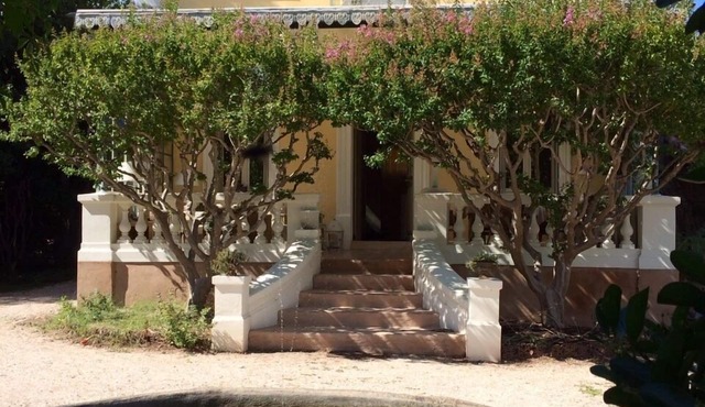 House of character with swimming pool on large garden, close to the sea.