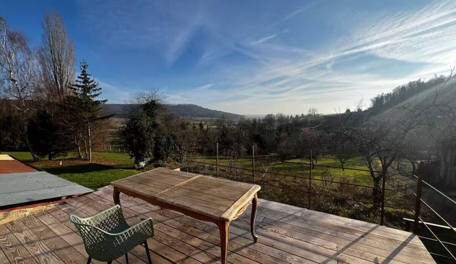 House with a terrace and a view of nature near Neufchâteau