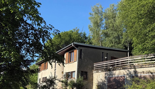 Large, quiet family home on the edge of the forest, overlooking the village.