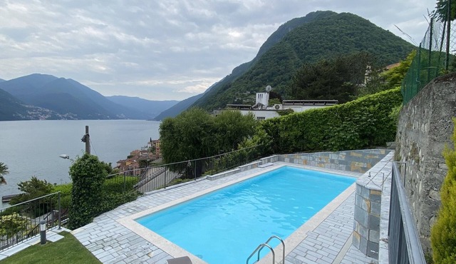 Modern duplex apartment with magic views and pool over the lake.