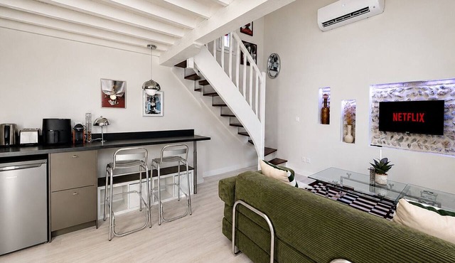 Quai 70: A retro duplex in the city center—brand-new, stylish, and air-conditioned.