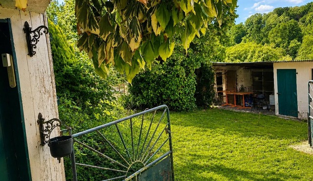 The Pianist's Stove Retreat: A Colorful, Artistic Country House & Garden