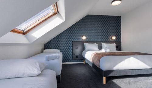 Quadruple Room with One Double Bed and Two Single Beds